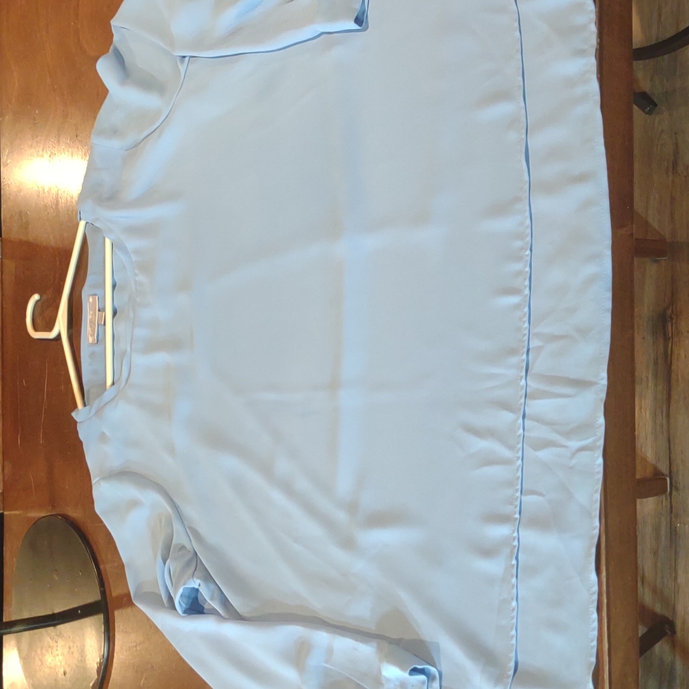 NWOT powder Blue Woman Top. 18/20